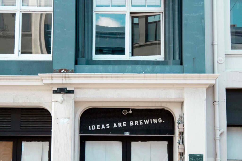 Building with a storefront that says "Ideas are brewing."